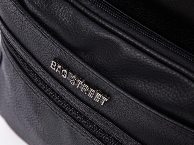 Metalowe logo z przodu torby